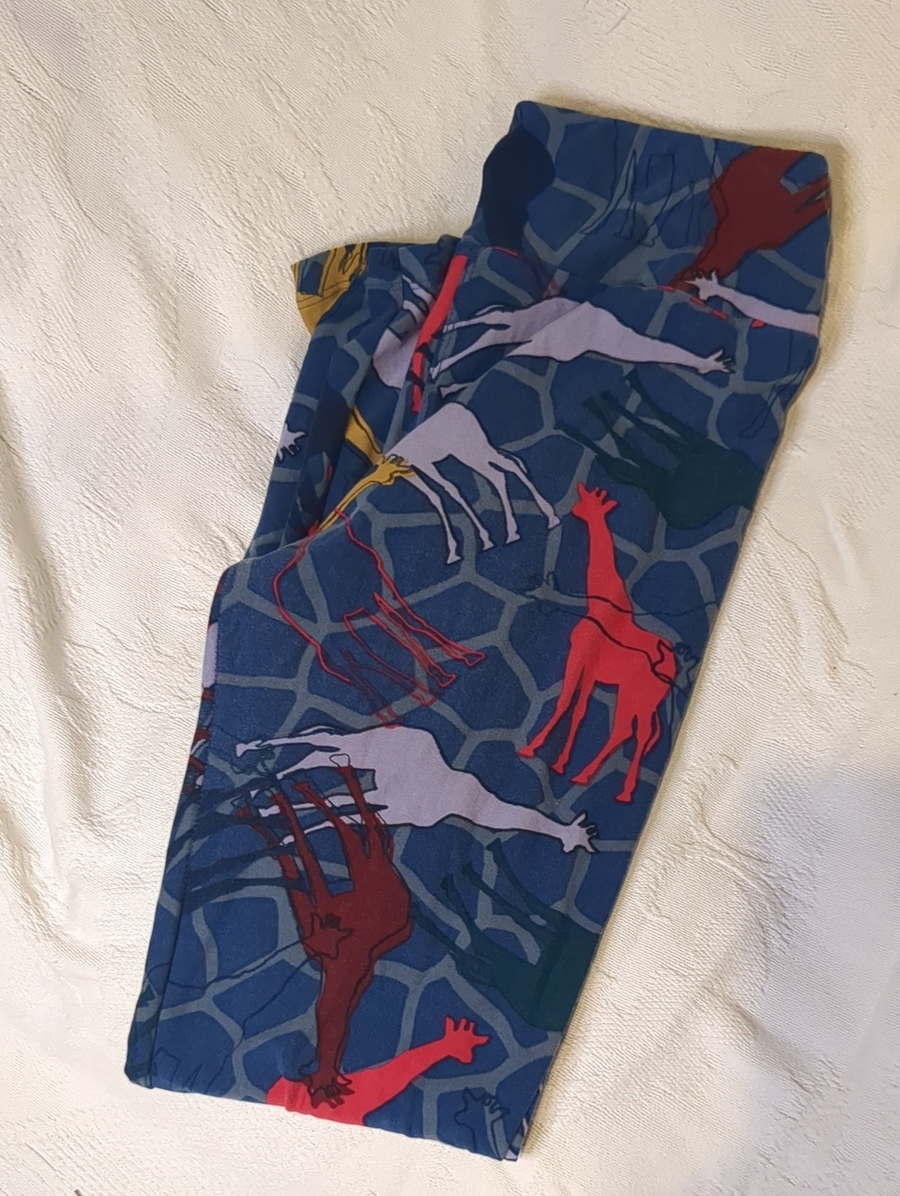 LuLaRoe Navy Leggings with Red, Purple, Green & Yellow Giraffes